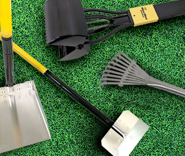 Waste management tools on turf.